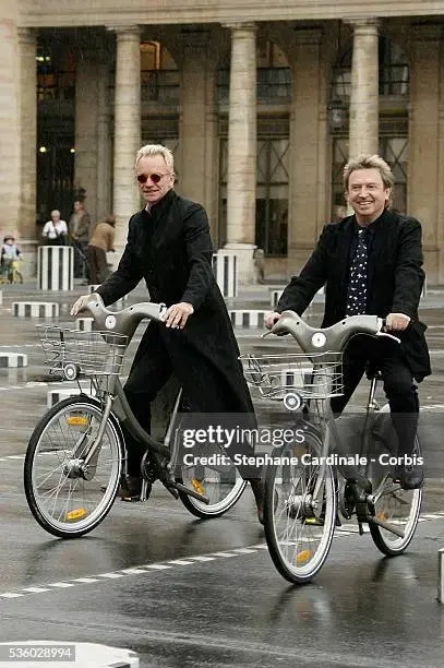 sting-and-andy-summers-arriving-by-paris-bicycle-velib-at-the-ministry-of-culture-in-paris-th...webp